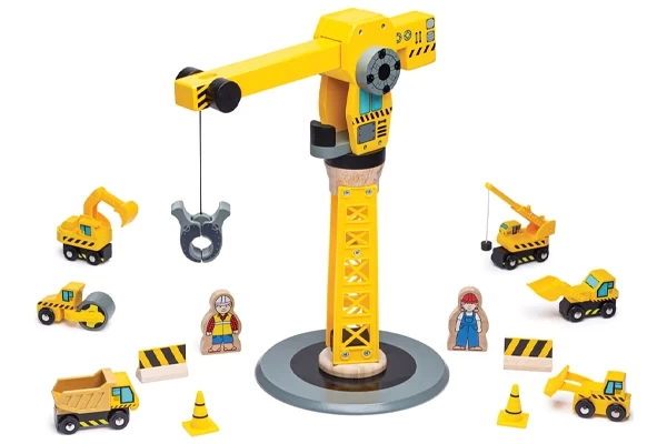 Grote hijskraan met bouwvoertuigen